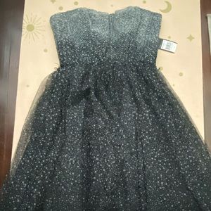 Sleeveless polka dot cocktail dress